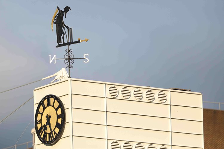 Father Time weather vane and clock at Lord's