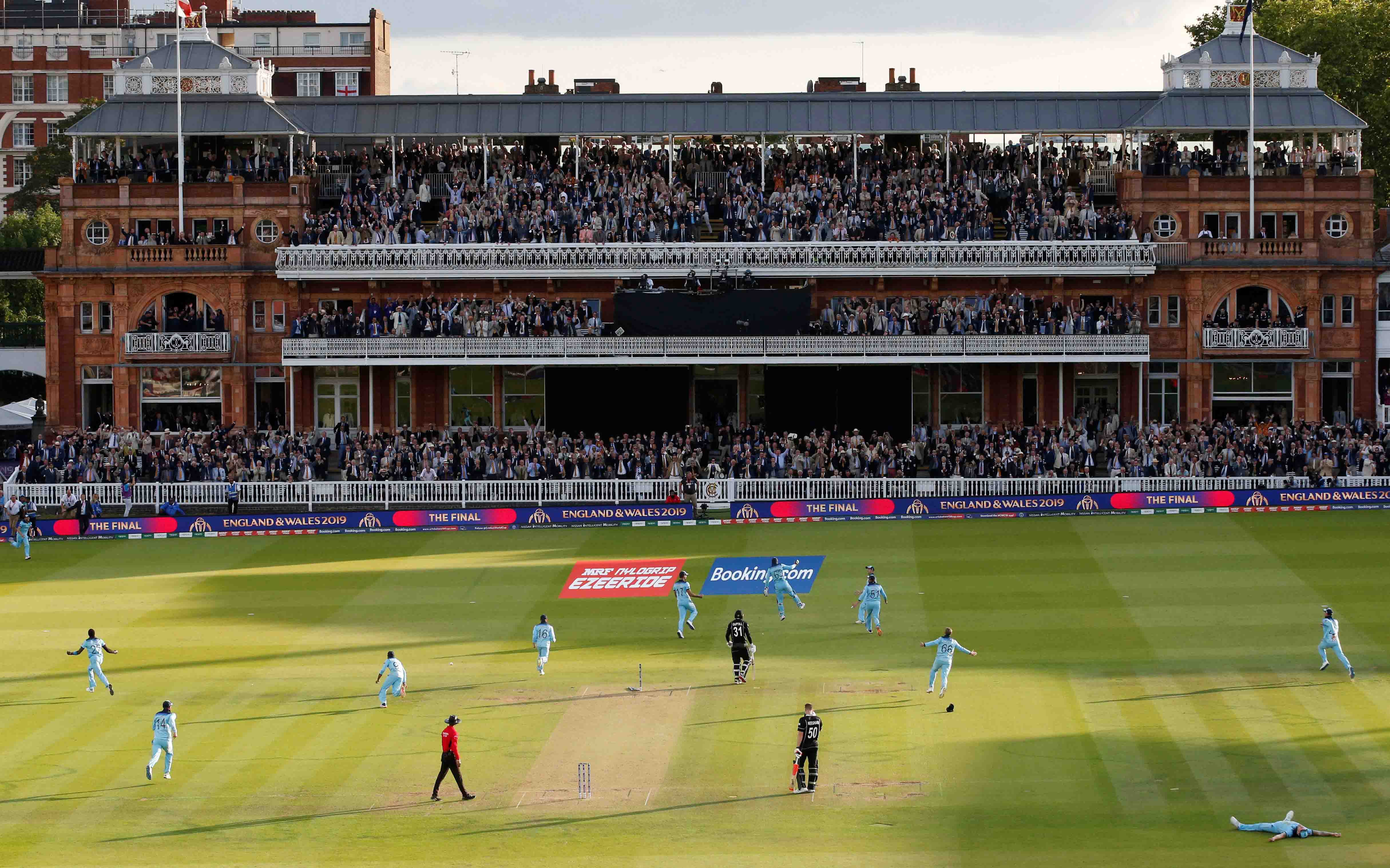 England players, fans and MCC Members in the Pavilion celebrate England winning the ICC Men’s Cricket World Cup Final at Lord’s.