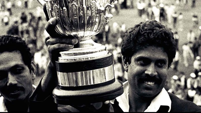 Kapil Dev with the 1983 Prudential Trophy