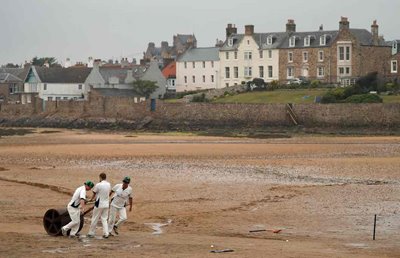 Members of the Ship Inn cricket team prepare for a match against Obolensky’s Heroes CC