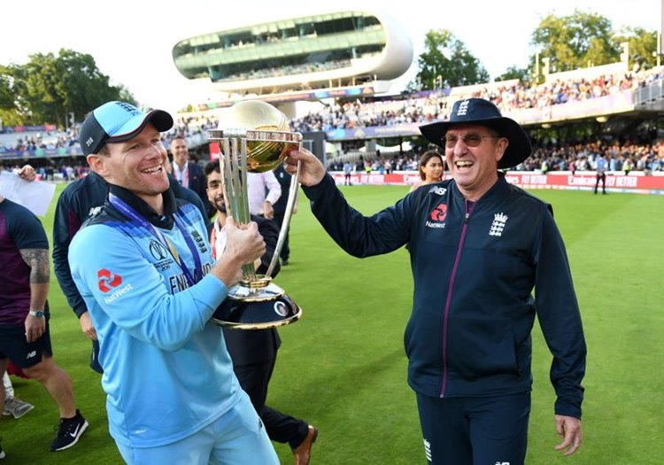 Eoin Morgan and Trevor Bayliss celebrate England's 2019 Cricket World Cup win at Lord's