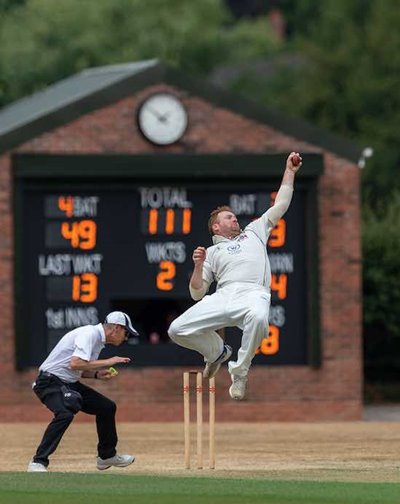 Stuart Burrows of Tamworth 1st XI clings on to a return catch