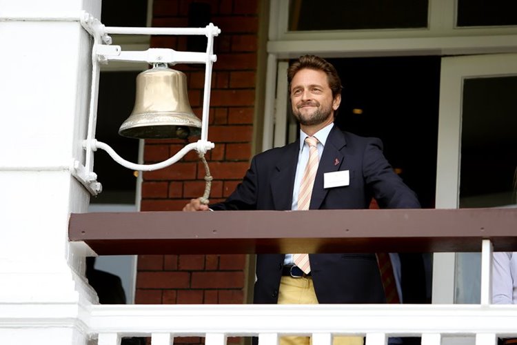 Ben Heyhoe Flint rings the five minute bell at Lord's