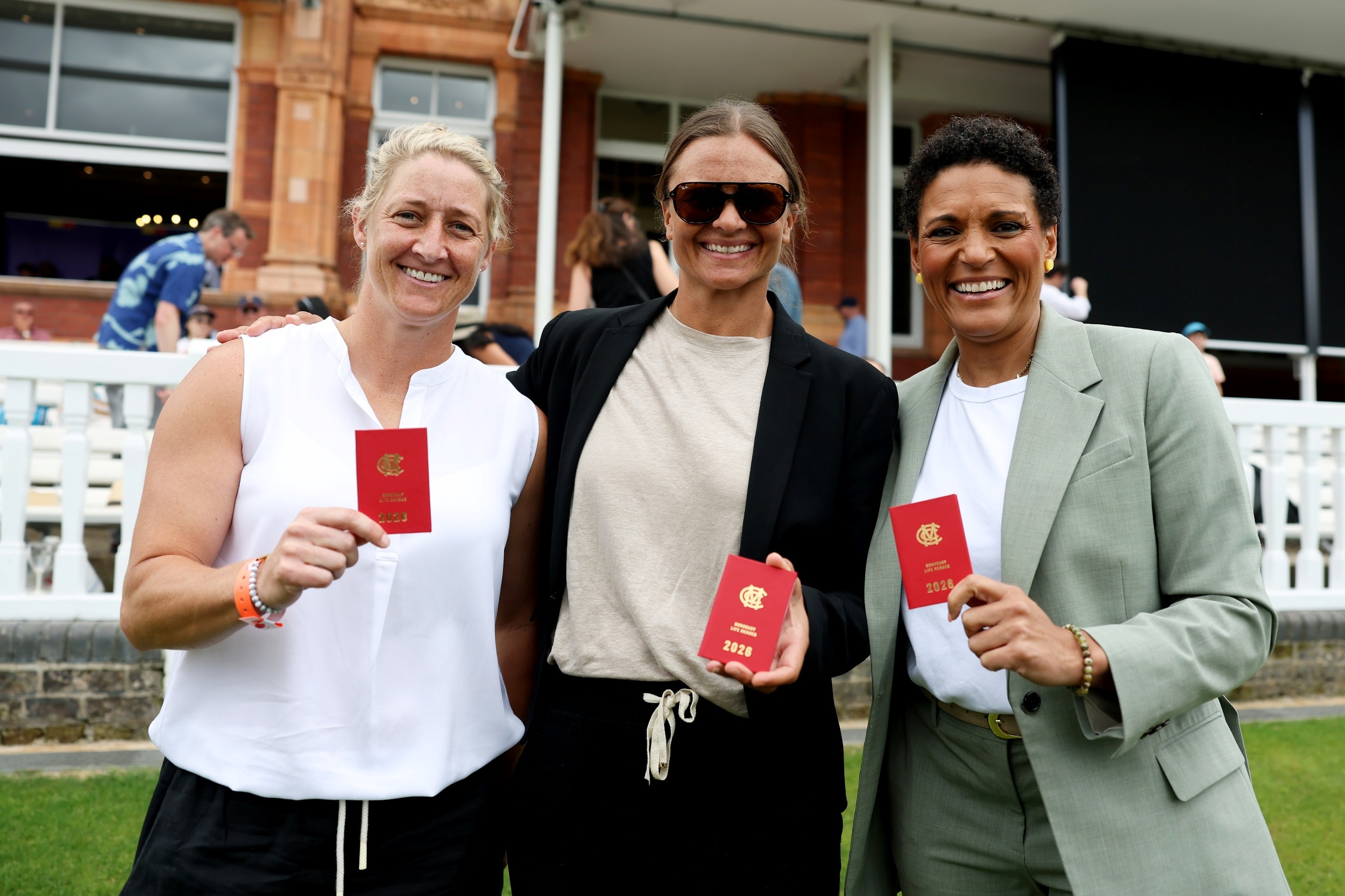 Sophie Devine, Suzie Bates and Mel Jones pose with their MCC Honorary Life Membership